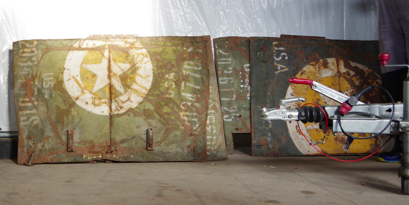 Illustration for article titled Germans Discover Military Jeep Hoods Used to Repair a Ceiling after World War II